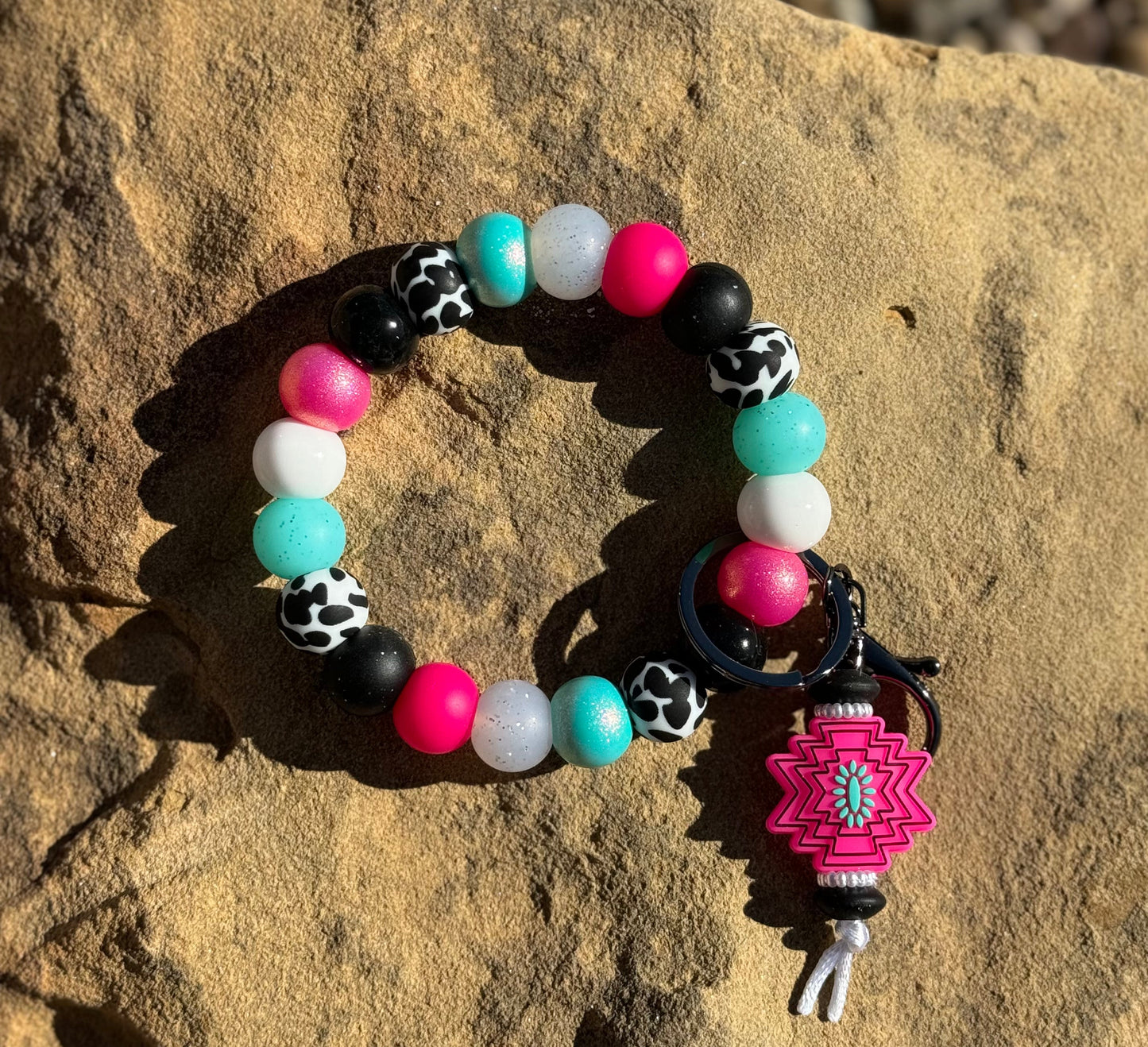 Pink Aztec cow wristlet